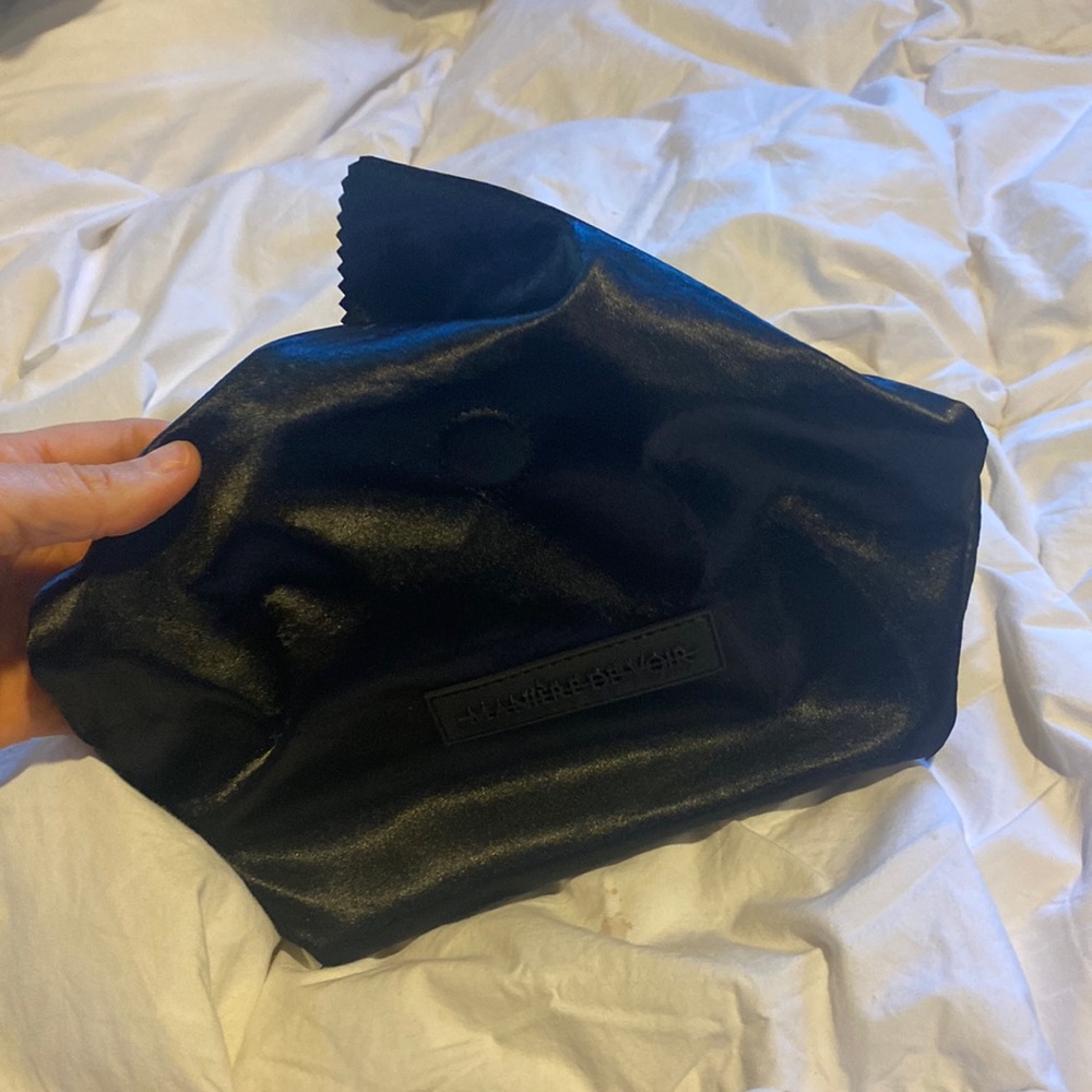 VERY UNIQUE CLUTCH SEXY